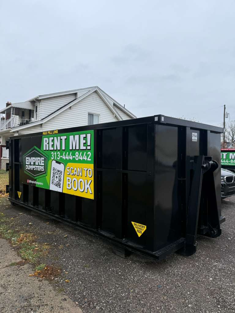 30 Yard roll-off dumpster with green rails, Empire Dumpsters